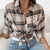 Ladies' checkered button-up shirt with patchwork pockets and long sleeves.
