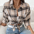 Ladies' checkered button-up shirt with patchwork pockets and long sleeves.